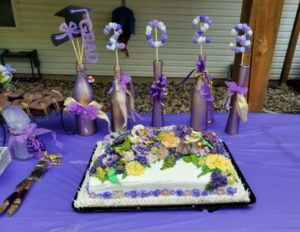 Elaborate Flower Graduation Cake with Meringue Pop Decor